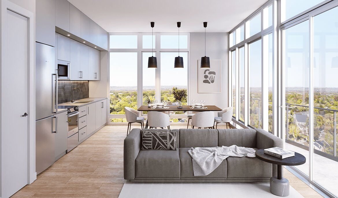 A modern living room in a new condo with a view of the city.