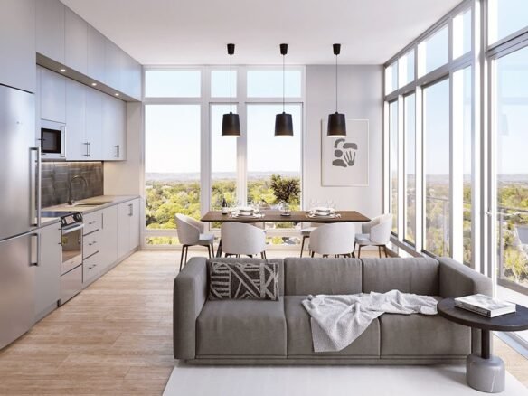 A modern living room in a new condo with a view of the city.
