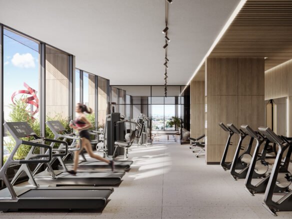 A gym with treadmills and elliptical machines.