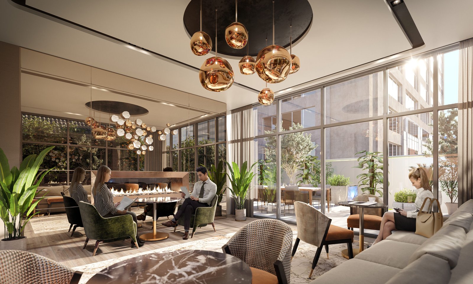 A modern lounge area in new homes showcases people seated around a fireplace, surrounded by green plants. The room features large windows, brown and beige seating, and contemporary copper pendant lights hanging from the ceiling, creating an inviting atmosphere.