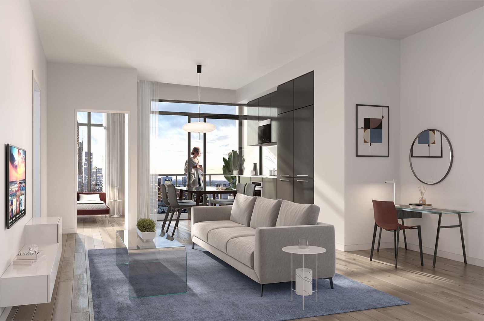Modern apartment interior featuring an open living space with a grey sofa, blue rug, and mounted TV. The kitchen area has dark cabinets and a dining table with two chairs. A large window offers a view of the city skyline, reminiscent of new condos in GTA. A bedroom is visible in the background.