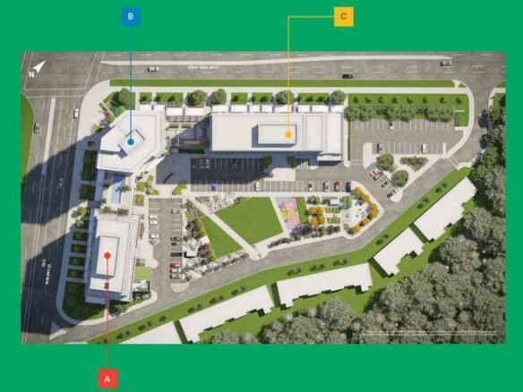 A top-down view of an urban development plan featuring new condos in GTA with marked locations in red, blue, and yellow. The site includes buildings, a parking lot, green spaces, pathways, and roads surrounding the area. Trees and greenery are visible around the development.