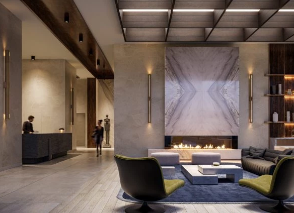 Modern hotel lobby featuring a large central fireplace, sleek sofas, and an elegant wooden bar area, with ambient lighting and a sophisticated architectural design showcasing New homes in Gta.