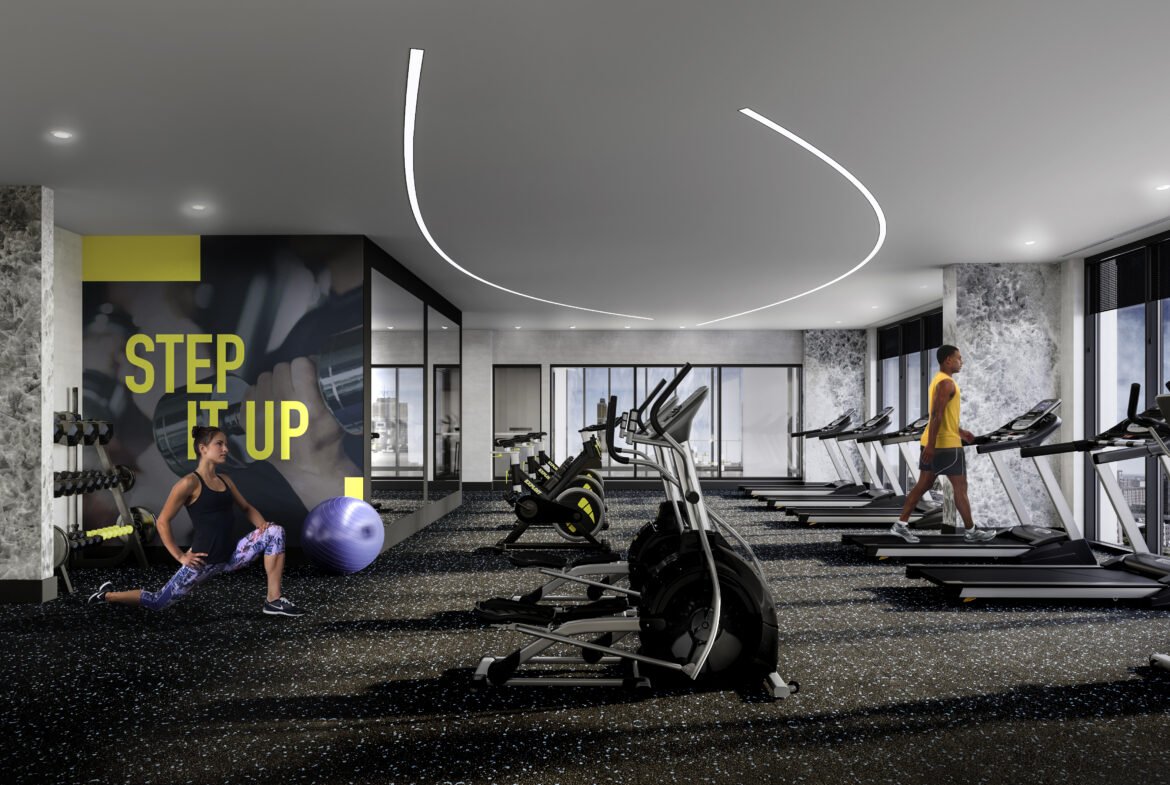 A modern gym with large windows and various exercise equipment. A person on the left is stretching using a stability ball, while another on the right is walking on a treadmill. A wall in the background features the text "STEP IT UP" in large, bold letters—a perfect amenity for those investing in new homes in GTA.