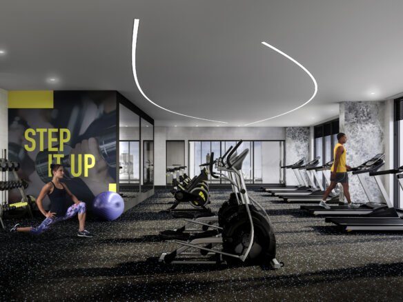 A modern gym with large windows and various exercise equipment. A person on the left is stretching using a stability ball, while another on the right is walking on a treadmill. A wall in the background features the text "STEP IT UP" in large, bold letters—a perfect amenity for those investing in new homes in GTA.