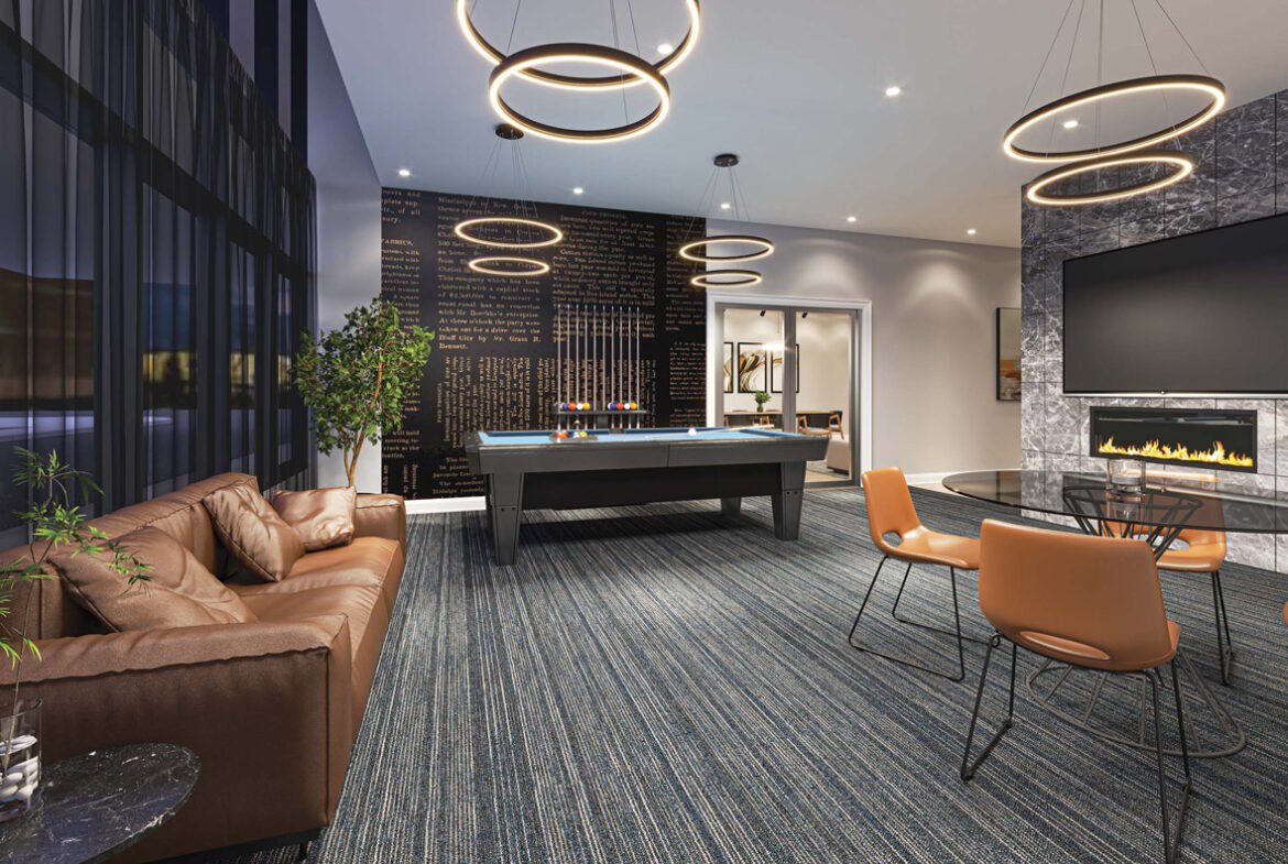 Modern lounge in new homes in GTA, featuring a pool table, leather sofa, circle pendant lights, a fireplace, and a bar area in a stylish indoor setting.