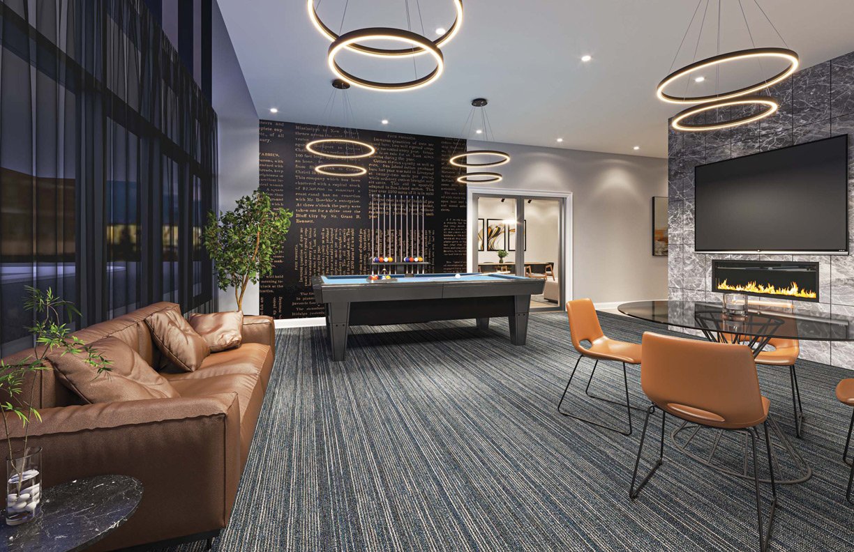 Modern lounge in new homes in GTA, featuring a pool table, leather sofa, circle pendant lights, a fireplace, and a bar area in a stylish indoor setting. Modern lounge in new homes in GTA, featuring a pool table, leather sofa, circle pendant lights, a fireplace, and a bar area in a stylish indoor setting.