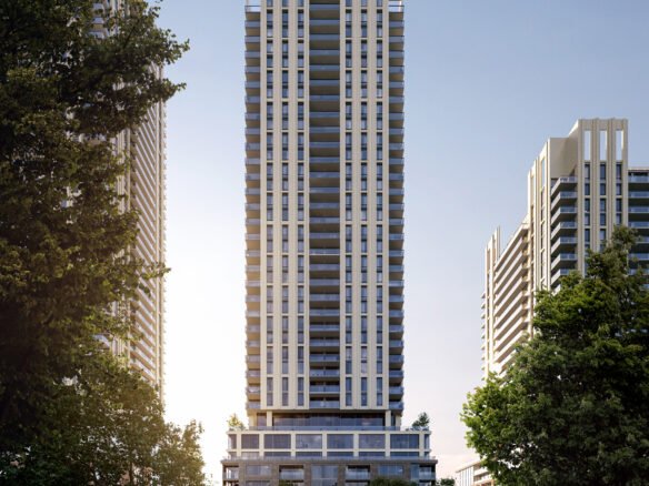 A modern high-rise residential building stands prominently in an urban setting, featuring new condos, bathed in sunlight with a glimpse of lush greenery.