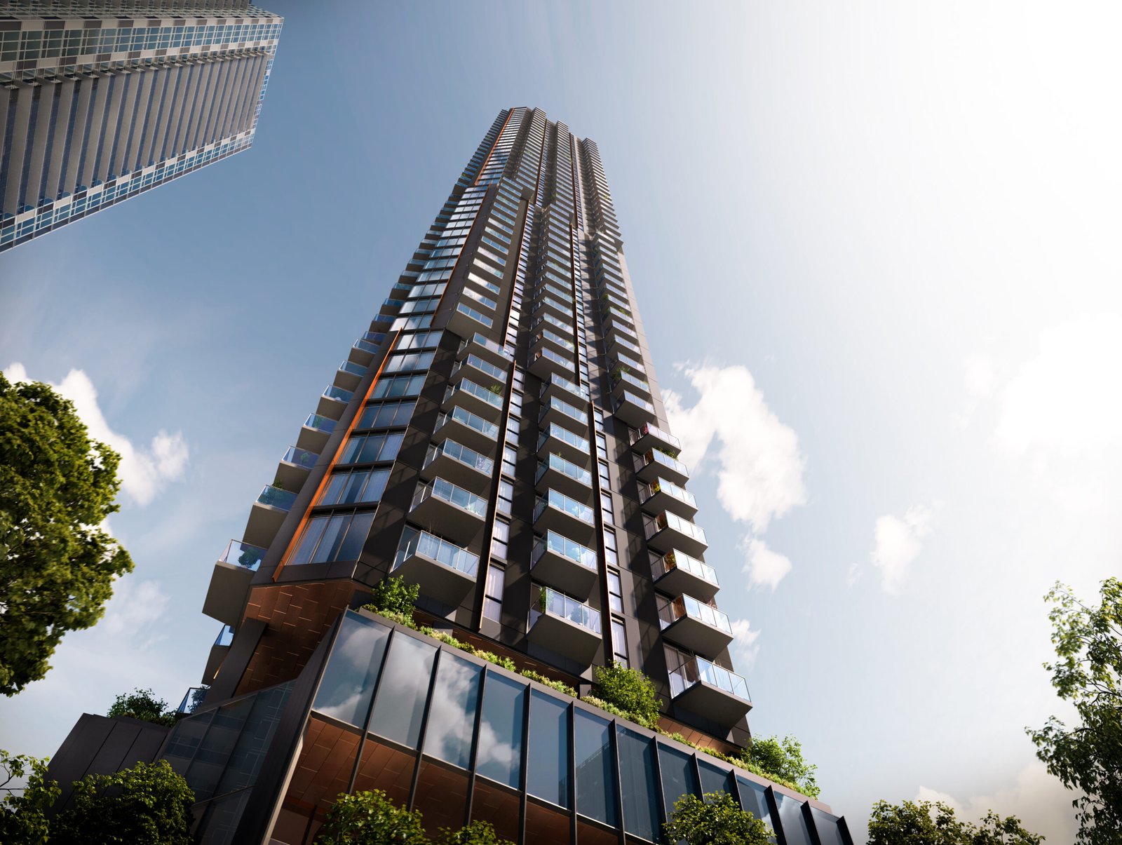 A modern skyscraper with a unique, layered architectural design, featuring a mix of reflective glass and rustic panels, rises under a clear sky, surrounded by lush greenery and new condos.
