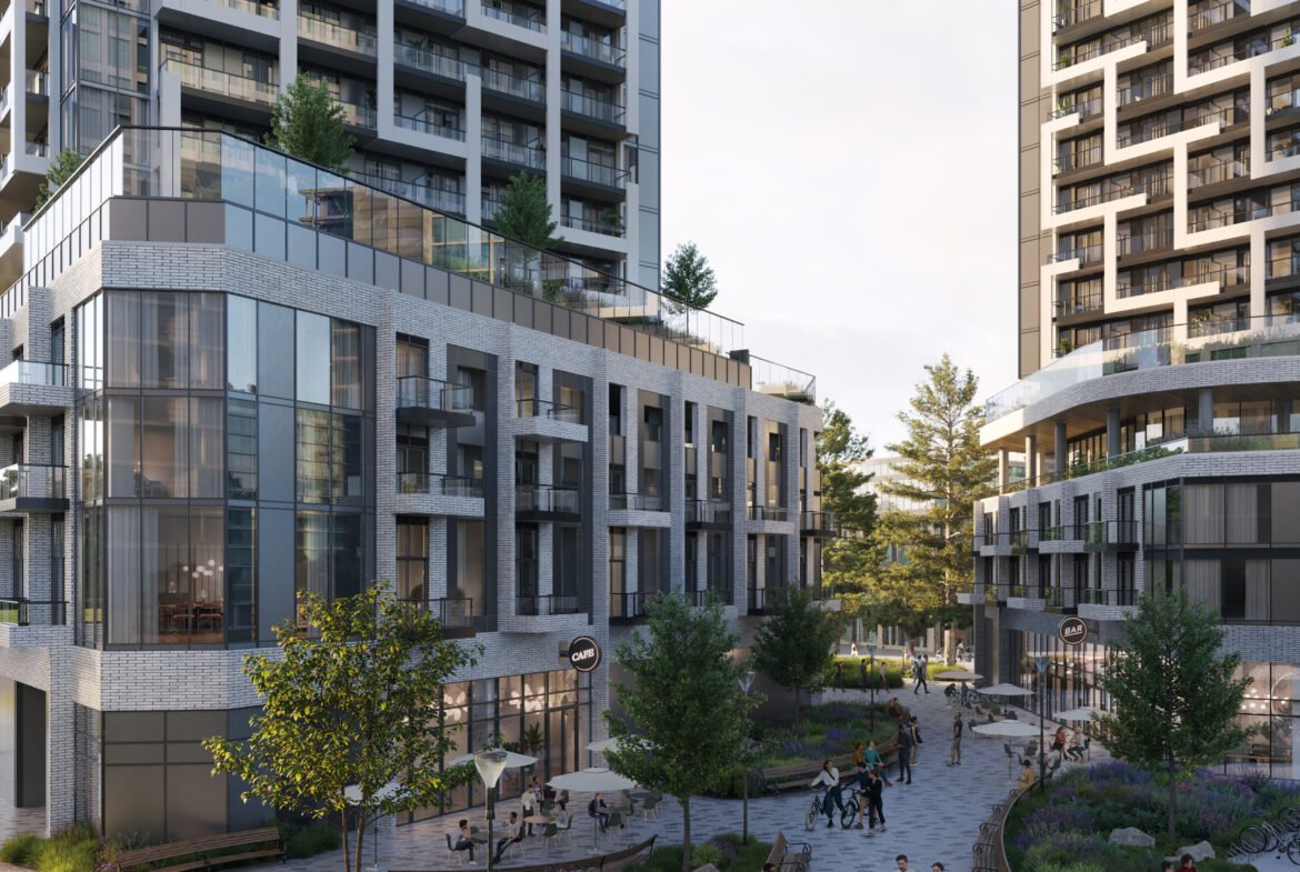 A group of people walking in a courtyard.