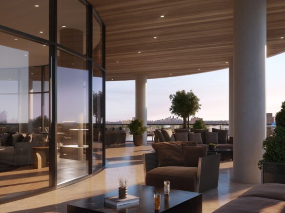 A modern, luxurious outdoor terrace with a wooden ceiling has comfortable seating, potted plants, and glass walls. The sun is setting, casting a warm glow over the scene. Two beverages from LSQ 2 sit on a low table, with distant cityscape views in the background.