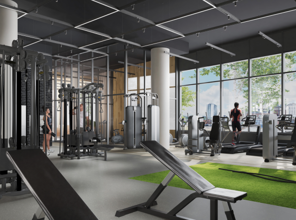 A modern gym with various exercise equipment, including weight machines, benches, and treadmills. Large windows provide a view of the cityscape and greenery outside, blending perfectly with the nearby new homes in GTA. People are using the equipment in this bright, clean space.
