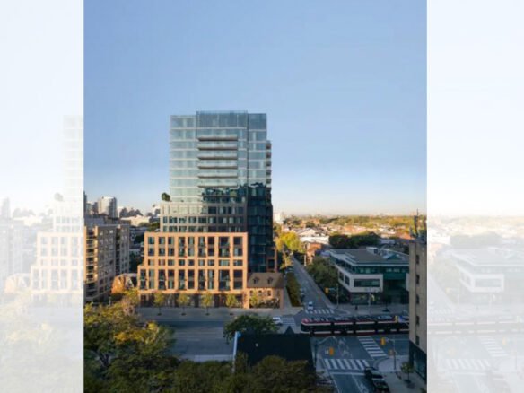 A modern high-rise building stands tall in an urban setting. The lower portion features a brick facade, transitioning to glass on the upper floors. The cityscape and streets below include nearby buildings, greenery, and intersecting roads with vehicles and pedestrians—perfect for new condos in GTA.