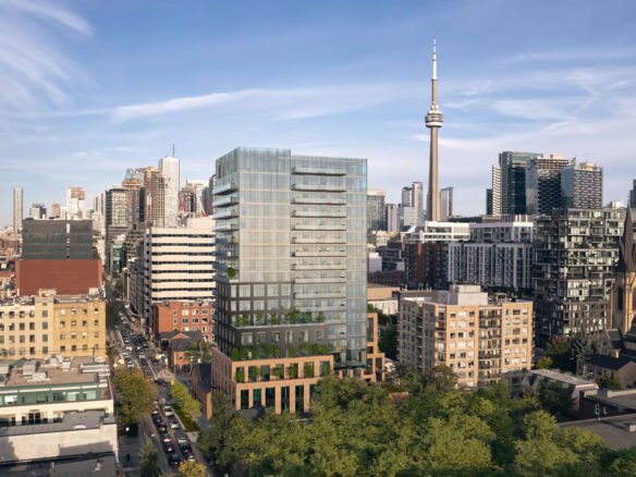 A city skyline blends modern high-rise buildings with historic architecture. The tallest tower commands attention, set against a clear blue sky. Green trees line the streets, adding natural beauty to the scene of new homes and development in Toronto's vibrant urban landscape.