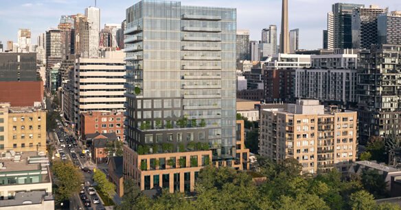 A view of a modern cityscape featuring various high-rise buildings. The central focus is on a tall glass building with balconies, surrounded by shorter office and residential structures. The streets below are lined with trees, adding greenery to the urban environment—an appealing sight for those seeking new condos in GTA.