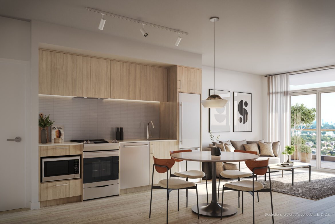 Modern open-plan kitchen and living room with sleek wooden cabinets, white countertops, and a cozy living space with a gray sofa and large window highlight features typical of new condos in GTA.