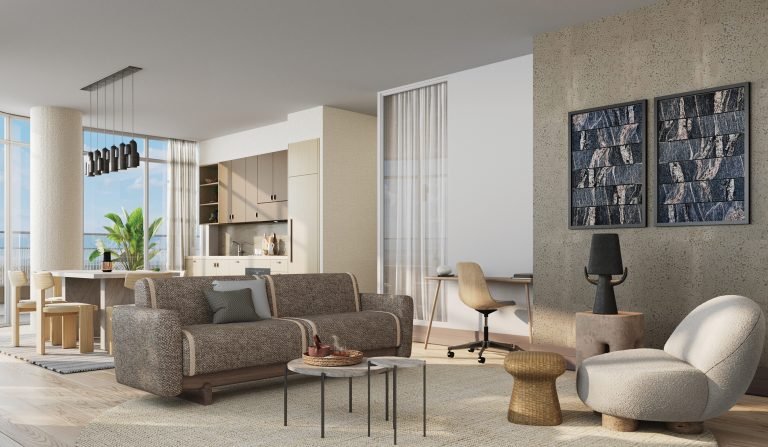 Modern living room in pre construction homes with a textured wall, couch, armchairs, coffee table, and a view of the sea through large windows. Bright, airy space with tasteful decorations and
