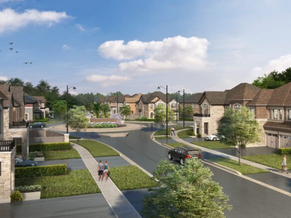 A suburban neighborhood with modern two-story houses, curved streets, and manicured lawns. A few people and a car are on the street. Trees and a roundabout with a garden enhance the scenic atmosphere under a blue sky with clouds, ideal for those seeking new homes in Brampton.