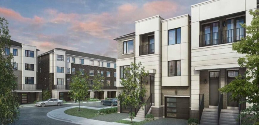 A modern townhouse complex showcases three-story buildings under a cloudy sky at dusk, with architecture featuring a mix of light and dark exterior panels. A circular driveway and trees grace the foreground, with a few parked cars visible, hinting at luxurious new homes in Brampton.