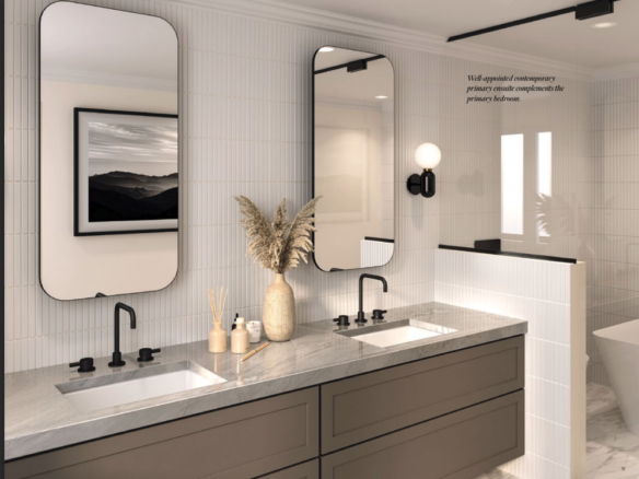 A modern bathroom in new condos in GTA features two rectangular mirrors above a double sink vanity with sleek black faucets. Neutral decor includes a vase with pampas grass and a reed diffuser. A wall-mounted light fixture and framed landscape art complete the setting, reflecting contemporary style.