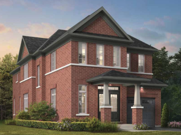 A charming two-story brick house with a dark roof and white-framed windows features a double garage. Surrounded by lush greenery and shrubs under a clear sky, it offers the allure of new homes in Brampton for those seeking modern comfort in a picturesque setting.