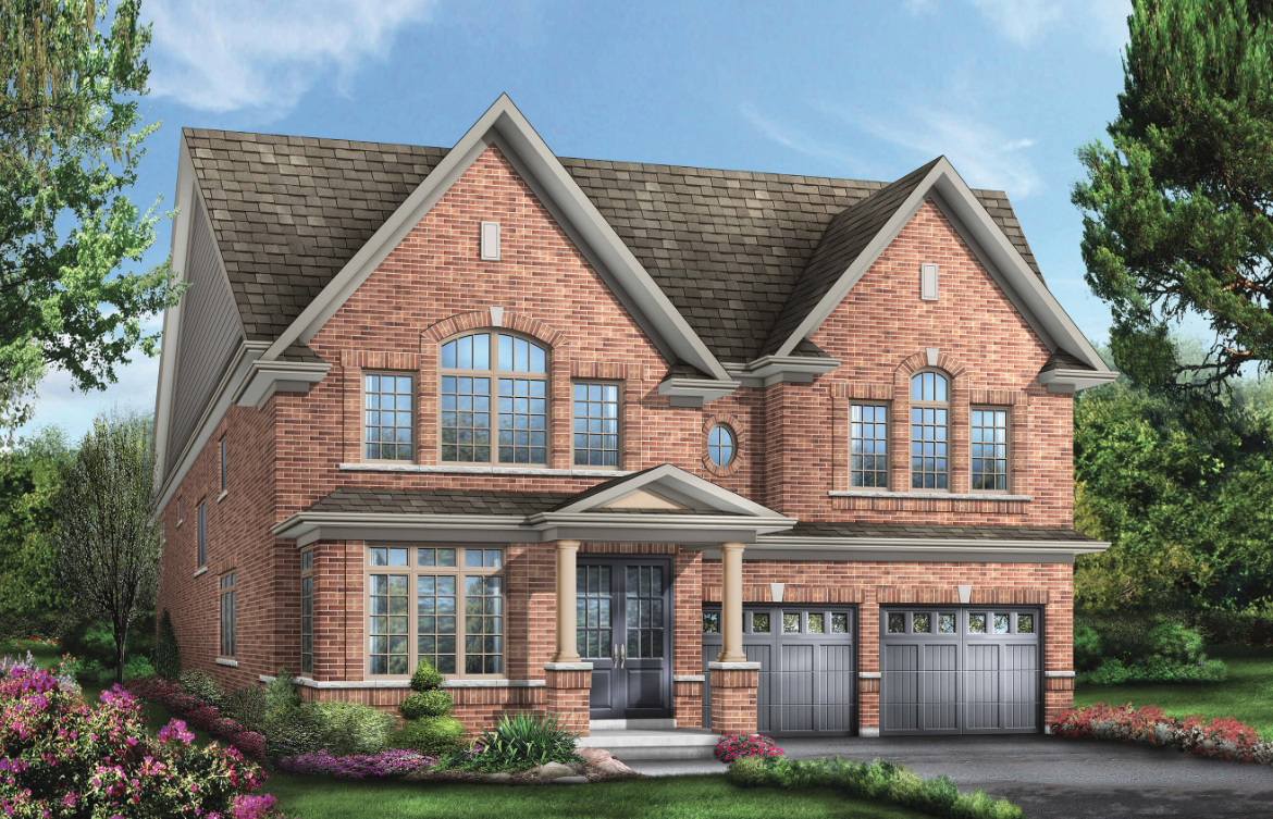 This large two-story brick house boasts a gabled roof, multiple windows, and two garage doors. The front yard is adorned with manicured shrubs and colorful flowers on a well-maintained lawn beneath the clear blue sky—a prime example of new homes in Brampton.