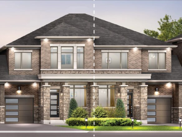 A modern two-story brick duplex, showcasing new homes architecture with large windows and two garages on each side. The symmetrical building is complemented by manicured shrubs and bushes in the front yard, offering an inviting aesthetic.