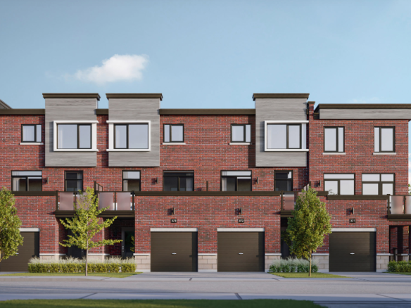 A row of modern new homes with red brick exteriors and large windows under a clear blue sky. Each unit features a balcony and a garage. Two cars are parked on the driveway, and small trees enhance the front of the buildings.