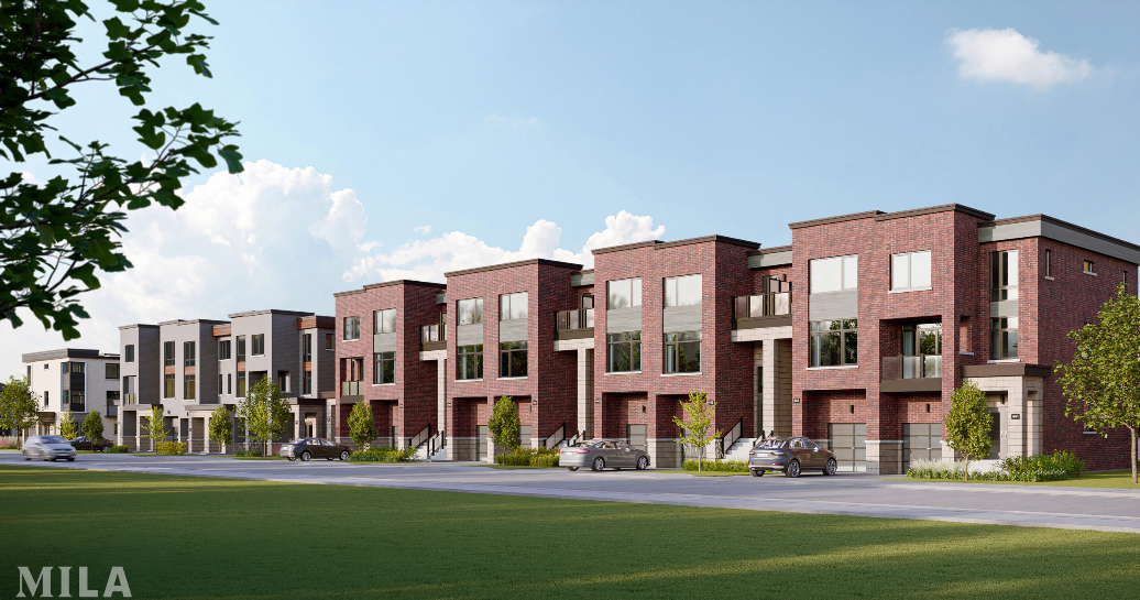 A row of modern townhouses with red brick facades and large windows under a blue sky showcases the charm of new condos in the GTA. Two cars are parked on the street in front, while small trees line the sidewalk. A grassy area enhances the foreground, offering a picturesque urban setting.