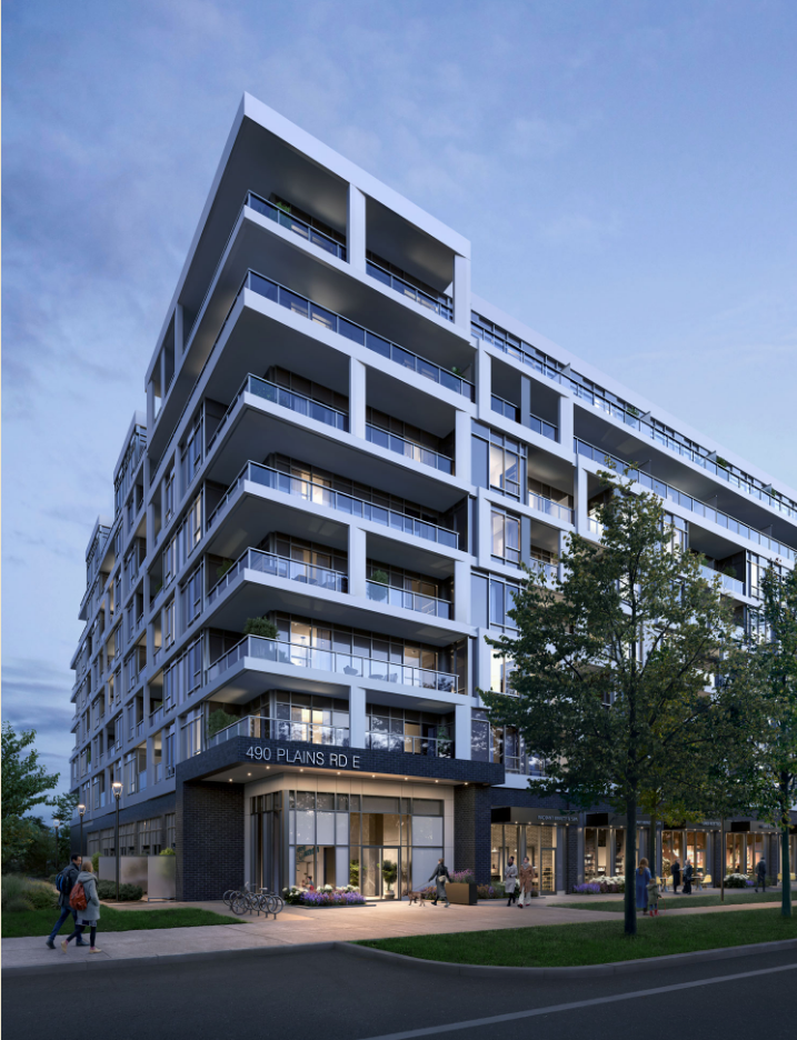 A modern multi-story apartment building at twilight features numerous balconies and large windows, showcasing new homes with contemporary design. The address “490 Plains Rd E” is visible on the facade, surrounded by trees and a bike rack. The sky is partly cloudy, adding to the serene streetscape. A modern multi-story apartment building at twilight features numerous balconies and large windows, showcasing new homes with contemporary design. The address "490 Plains Rd E" is visible on the facade, surrounded by trees and a bike rack. The sky is partly cloudy, adding to the serene streetscape.