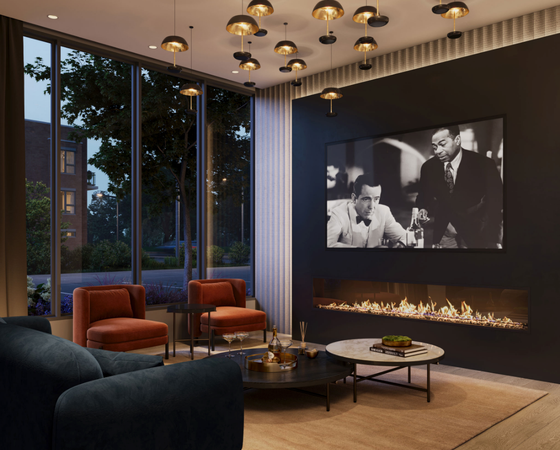 A modern living room in new homes features a sleek fireplace, a large black-and-white movie still on the wall, two orange armchairs, a dark sofa, and a round coffee table. Floor-to-ceiling windows reveal an evening cityscape, while hanging lights add warmth. A modern living room in new homes features a sleek fireplace, a large black-and-white movie still on the wall, two orange armchairs, a dark sofa, and a round coffee table. Floor-to-ceiling windows reveal an evening cityscape, while hanging lights add warmth.
