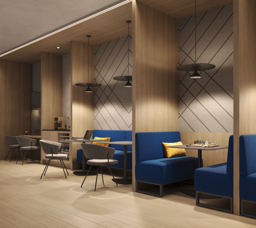 A modern lounge area with wooden interiors features blue booths with yellow cushions, round tables, and gray chairs. Geometric wall patterns and pendant lights create a cozy ambiance, perfect for those exploring new homes in Toronto.