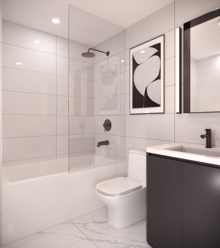 The Park Place VMC-inspired minimalist bathroom features a shower, bathtub, modern vanity with a black faucet, and toilet. Large gray tiles line the walls with a black and white abstract art piece above the toilet. The floor showcases sleek white tiles.