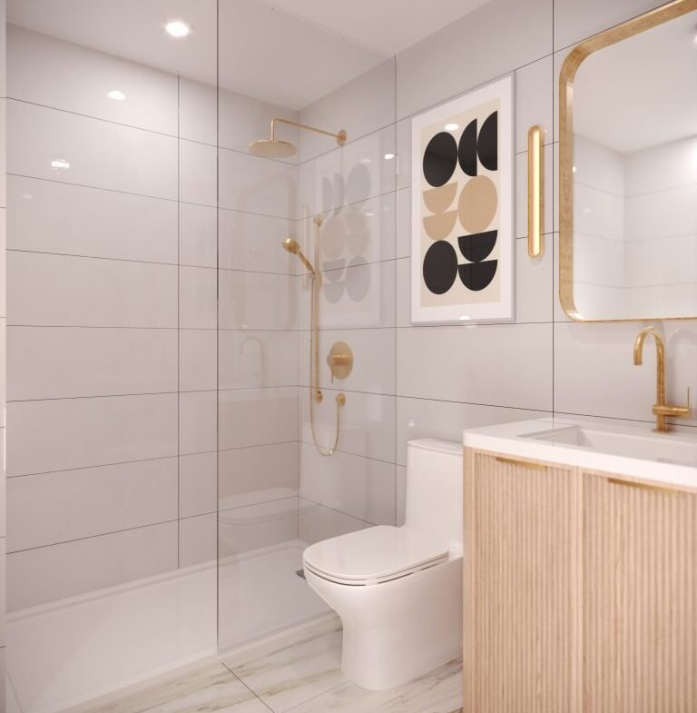 A modern bathroom in VMC Condos features light gray tiles, a gold showerhead, and a matching faucet. A framed abstract artwork adorns the wall, while a mirrored cabinet sits above the wooden vanity. The marble-patterned floor adds elegance to this Park Place residence.