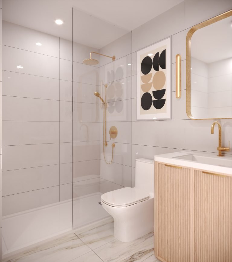 A modern bathroom in VMC Condos features light gray tiles, a gold showerhead, and a matching faucet. A framed abstract artwork adorns the wall, while a mirrored cabinet sits above the wooden vanity. The marble-patterned floor adds elegance to this Park Place residence.