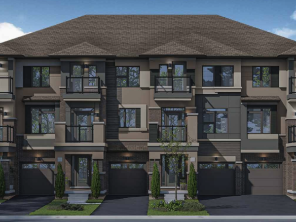 Discover a modern townhouse complex with a brown and gray facade, boasting multiple new homes. Each unit offers large windows, balconies, and individual garages. The buildings are surrounded by neatly landscaped greenery under a clear blue sky.