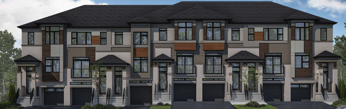 A row of new homes in Brampton with a blend of beige, gray, and wood panel exteriors. Each unit features large windows, a black shingled roof, and attached garages. The surrounding area is adorned with lush greenery under a clear blue sky.