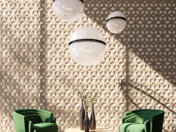 A modern interior with two green armchairs and a round wooden table adorned with vases. Large spherical pendant lights hang from the ceiling against a geometric patterned wall. Sunlight casts shadows, creating a warm and inviting atmosphere, perfect for envisioning new homes in Toronto.
