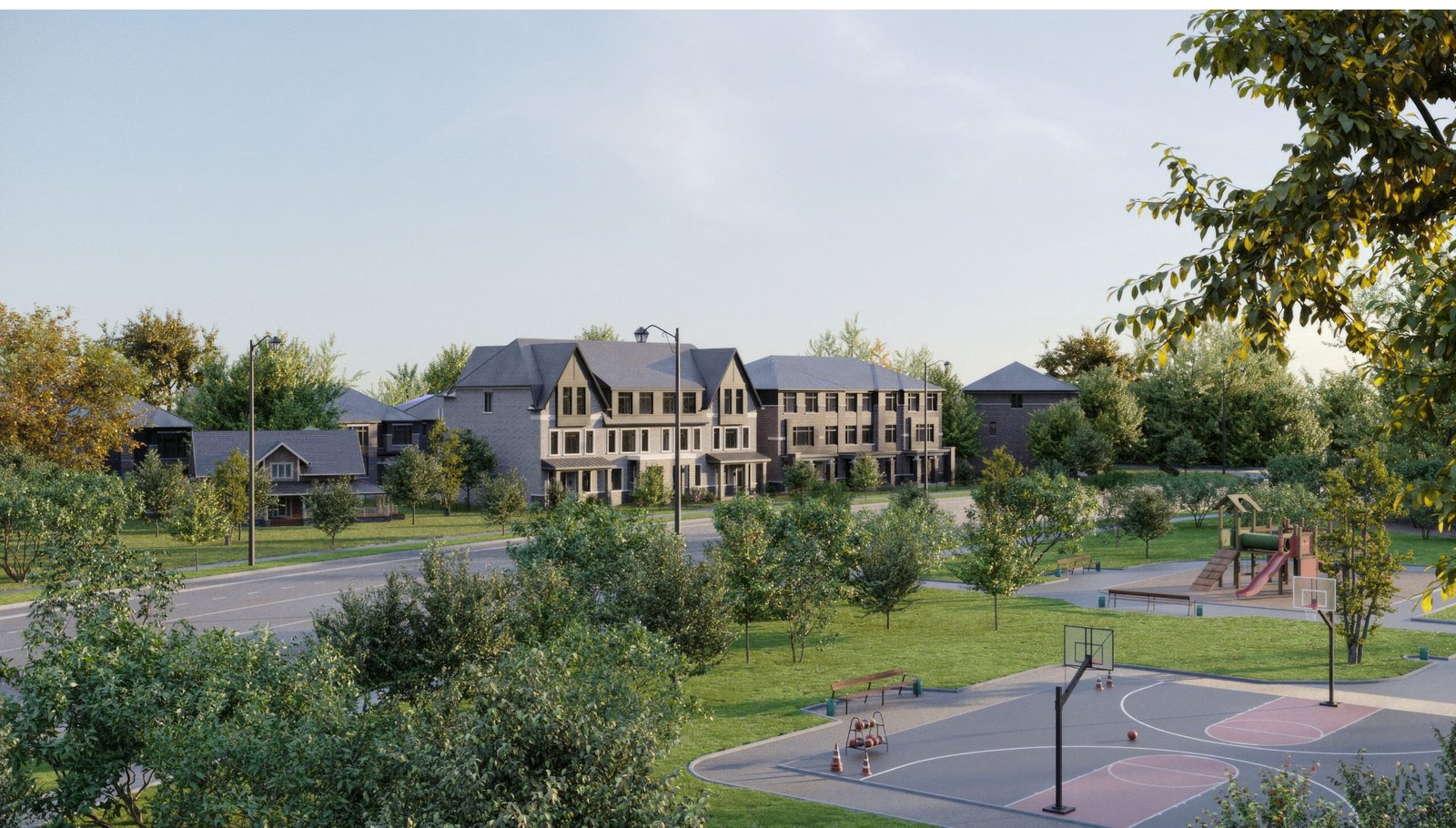 A row of modern townhouses surrounded by greenery is seen across the street from a park. This inviting area features basketball courts and a playground, with trees scattered throughout under a clear sky. These new condos in the GTA offer an ideal blend of nature and urban living.