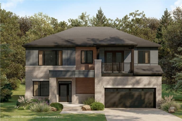 A modern two-story house in The Conservancy boasts a blend of brick and wood exterior, large windows, and a black garage door. Nestled amid lush greenery and trees, this tranquil residence sits under a clear blue sky.