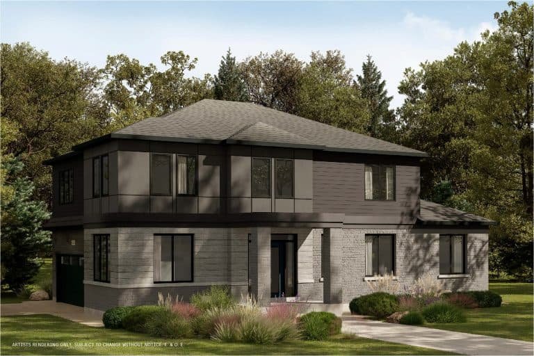 A modern two-story house with light and dark gray siding is nestled in The Conservancy, surrounded by a well-maintained lawn, shrubs, and trees. The clear sky allows the sun to cast gentle shadows on the house and garden.