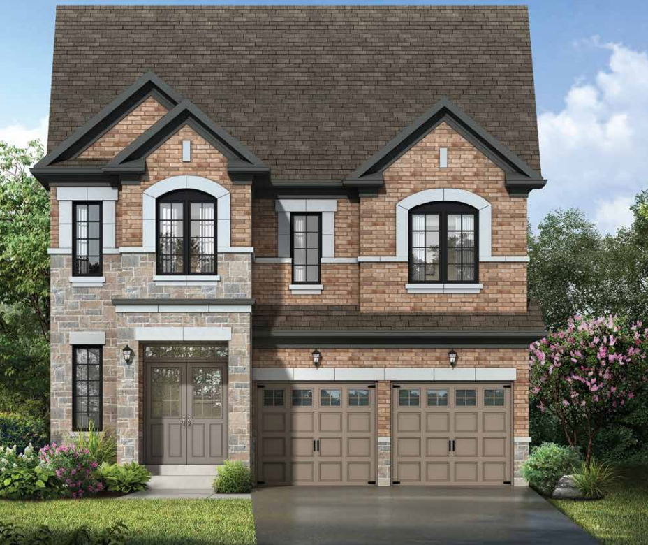 A two-story brick house with a stone facade features large windows and a brown shingled roof. This pre-construction home boasts two garage doors and is surrounded by green shrubs and trees under a clear blue sky.