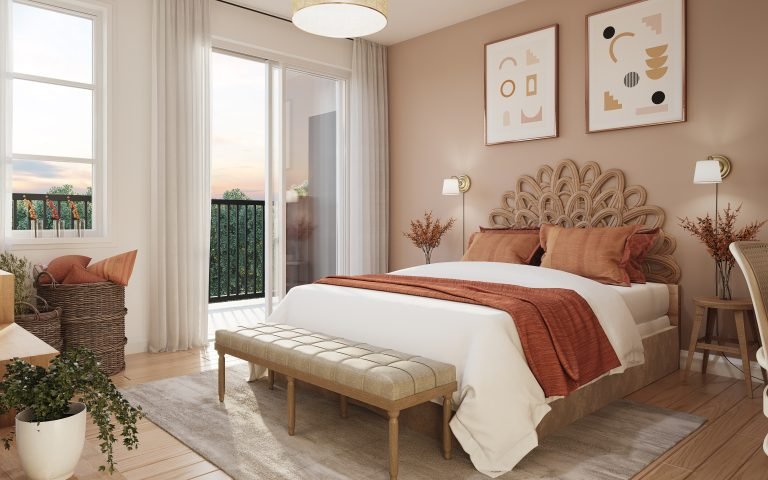 Experience a cozy bedroom in one of the new condos featuring a beige and burnt orange color scheme. Highlights include a bed with decorative pillows, a woven headboard, framed abstract art, a bench at the foot of the bed, a potted plant, and a balcony offering stunning views—a perfect retreat within Sg Homes.