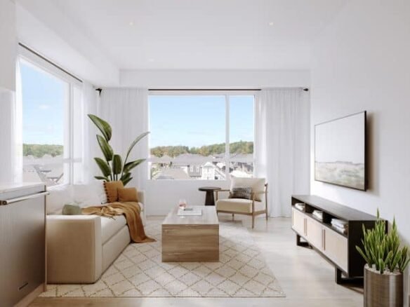 Modern living room in a new GTA home with a beige sofa, wooden coffee table, and flat-screen TV on a stand. Large windows with sheer white curtains offer rooftop and greenery views. A potted plant and decorative rug complete this elegant pre-construction space.