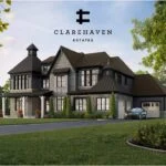 A large, elegant, two-story mansion with modern architecture located in Clarehaven Estates. The house features dark exterior accents, multiple gables, extensive windows, and a spacious garage. A sleek gray car is parked in the driveway surrounded by well-maintained greenery.