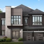 Unionville Upper East Side homes, Fieldgate Homes Unionville, luxury townhomes in Markham, pre-construction homes in Unionville, invest in Markham real estate, Unionville community amenities, best neighborhoods in Markham, family-friendly living in Unionville, exclusive incentives for new homes, serene living in Unionville, quality schools in Unionville, outdoor recreation in Markham, modern homes near Toronto, Unionville real estate investment, luxury living in Markham.A modern two-story house with a mix of dark brick and light stone exterior. It features large windows, a double garage with gray doors, and a lush green lawn with shrubs and trees surrounding the property. Reminiscent of Upper East Side elegance, the sky is clear with a few clouds floating by.