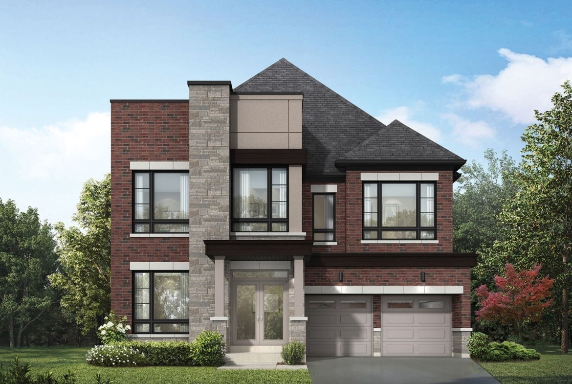 Unionville Upper East Homes A modern two-story house in Unionville featuring a combination of red brick and stone facade. Large windows dominate the front, along with a two-car garage and a manicured lawn. The sky is clear with a few scattered clouds, and trees surround the property, adding greenery.