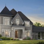 Gates of Nobleton A two-story stone house with a steep, dark gray roof is shown. It features large windows, a prominent front door, and an attached carport. Set in the prestigious Gates of Nobleton, the home boasts a well-maintained lawn with shrubs and flowers. The sky is clear, suggesting a sunny day.