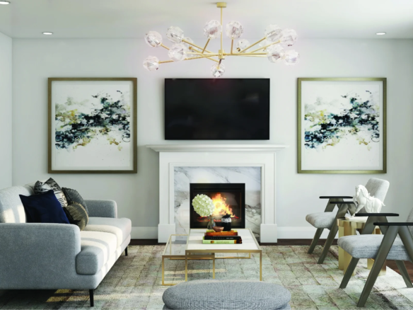 Modern living room at CALEDON CLUB featuring a gray sofa, armchairs, coffee table, and fireplace beneath a wall-mounted TV. Abstract art and gold decor frame the space, while a contemporary chandelier adds elegance overhead.