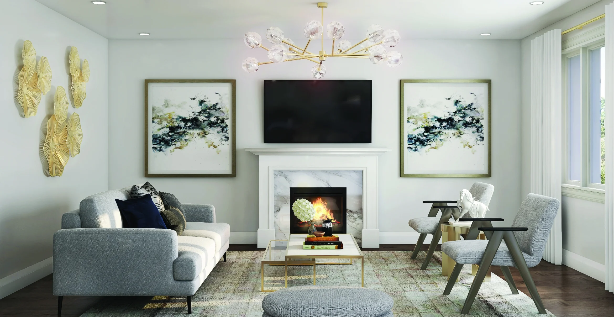 Modern living room at CALEDON CLUB featuring a gray sofa, armchairs, coffee table, and fireplace beneath a wall-mounted TV. Abstract art and gold decor frame the space, while a contemporary chandelier adds elegance overhead.